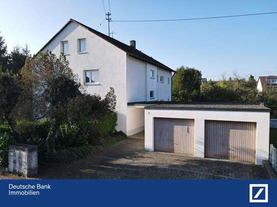 Dreifamilienhaus mit Wasser-Wasser-Wärmepumpe, großem Grundstück und zusätzlichem Baupotenzial