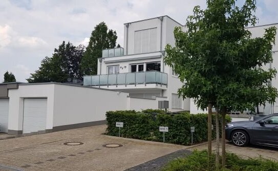 EG-Wohnung mit Terrasse, Gartenanteil und Stellplatz mit Wallbox