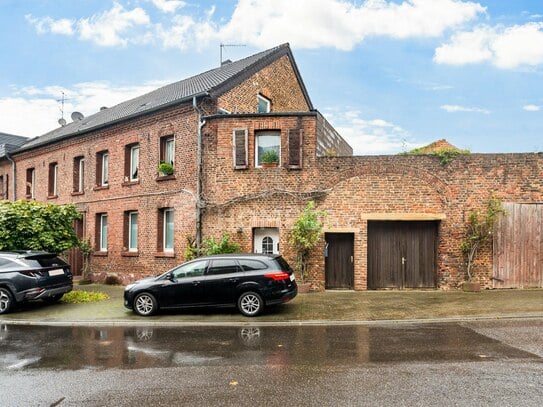 Teilvermietetes Mehrfamilienhaus mit 3 WE, sonniger Terrasse und Ausbaupotenzial in ruhiger Lage