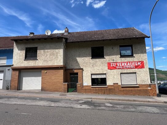 Einfamilienhaus mit Garage und Rheinblick