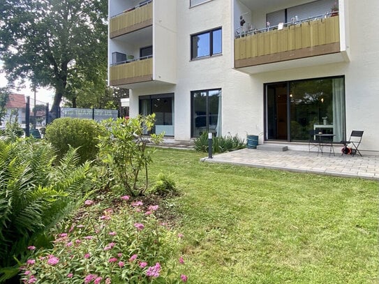 Moderne 3 Zimmer Wohnung mit Südwest Garten, Tiefgaragenstellplatz + zusätzlichen Büro +Garten