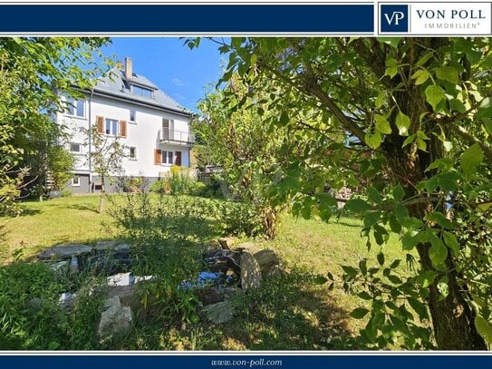 Charmantes Familienhaus auf sonnigem Grundstück mit großem Garten, Balkon, Terrasse und Doppelgarage