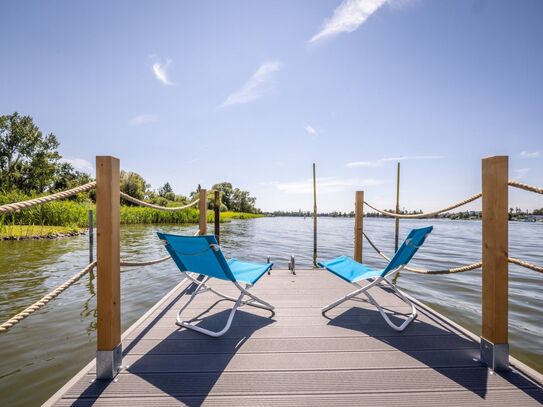 Bauträgerfreies Baugrundstück am See mit Bootsliegeplatz und Badefloß