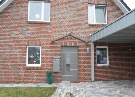 3 Zimmer-Erdgeschoss-Wohnung mit Carport