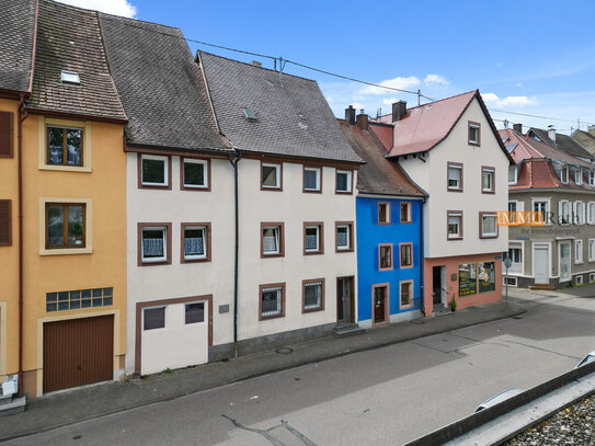 IMMORath.de - Charmantes Mehrfamilienhaus mit zwei Terrassen