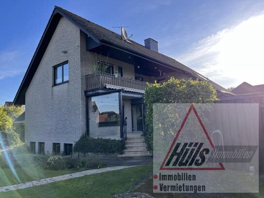 gepflegtes Zweifamilienhaus mit zusätzlichen Appartment, Doppelgarage in ruhiger Siedlungslage