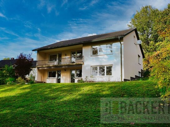 Einfamilienhaus mit Einliegerwohnung und fantastischem Fernblick!