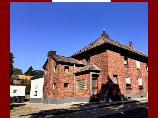 Doppelhaushälfte mit zwei Wohneinheiten und großem Garten in Übach-Palenberg, Stadtteil Marienberg