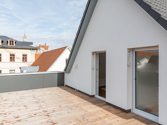 Neue 2-Zimmer-DG-Wohnung mit riesiger Dachterrasse und Schloßblick in exklusiver Innenstadtlage