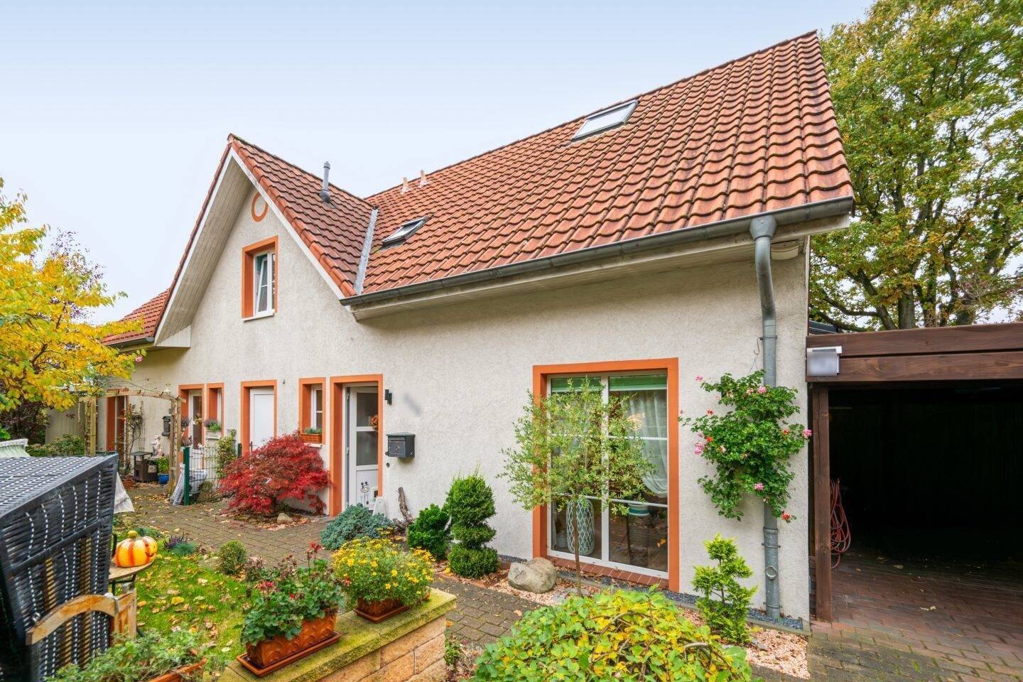 Charmante Doppelhaushälfte mit Gartenidylle, Carport und perfekter Familienlage in Kaltenkirchen