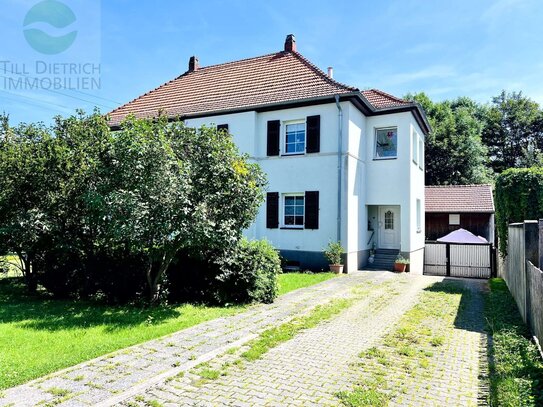 Vermietete Doppelhaushälfte mit Nebengelass und Garten am Fluss als Kapitalanlage in Geraberg