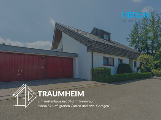 TRAUMHEIM - Einfamilienhaus mit 348 m² Innenraum, einem 594 m² großen Garten und zwei Garagen