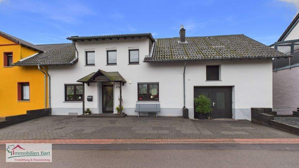 Immobilie in Mettlach - METTLACH-NOHN: WOHNHAUS MIT 2 WOHNUNGEN / GARAGE / GARTEN IN RUHIGER WOHNLAGE! - Bild 0