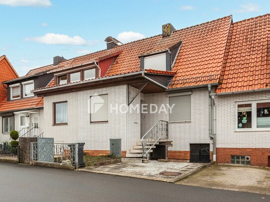 Ihr neues Zuhause: Reihenmittelhaus mit Garten, großem Wintergarten und Stellplatz in ruhiger Lage