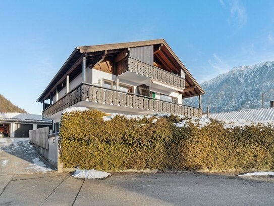 Helle 2-Zimmer-Gartenwohnung in Oberau mit großer Südterrasse. Ruhig und verkehrsgünstig gelegen.