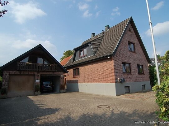 Mehrfamilienhaus mit 3 Wohneinheiten, Wirtschaftsgebäude, großzügigen Nebenflächen und großen Garten