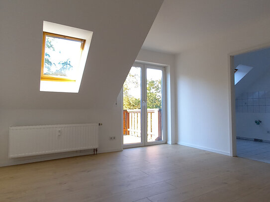 3-ZIMMER-WOHNUNG MIT DACHTERRASSE UND CARPORTSTELLPLATZ