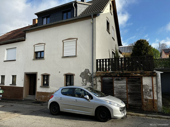 Einfamilienhaus mit Garten und Garage