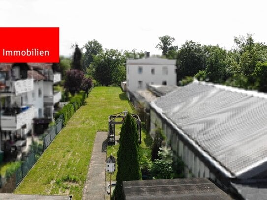 Charmantes Einfamilienhaus mit großem Sonnengrundstück und direktem Mainzugang