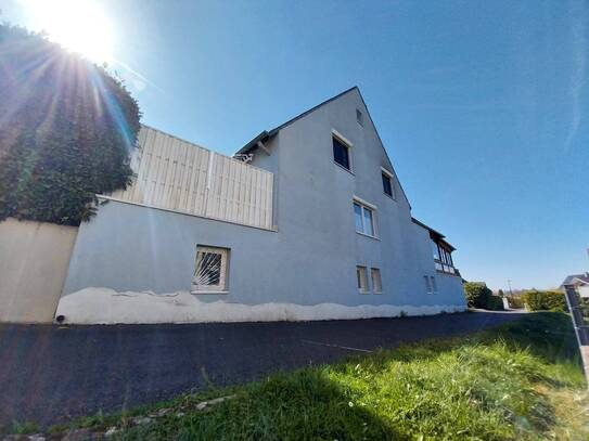 Einseitig angebautes Einfamilienhaus