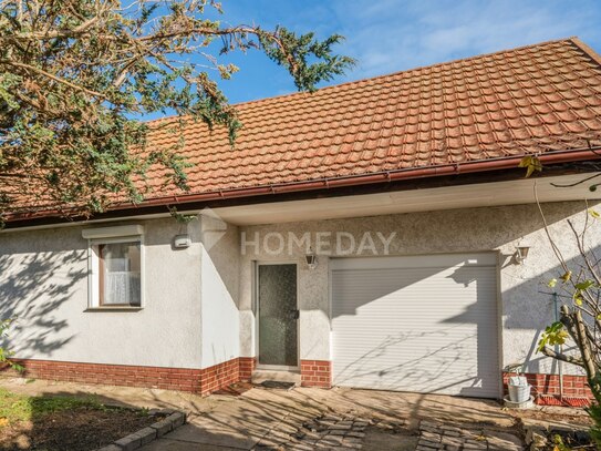 Einfamilienhaus mit Garten, Garage und viel Potenzial in Ahrensfelde