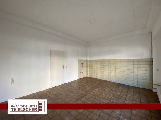 Günstige 2 Zimmer Erdgeschosswohnung mit kleinem Balkon