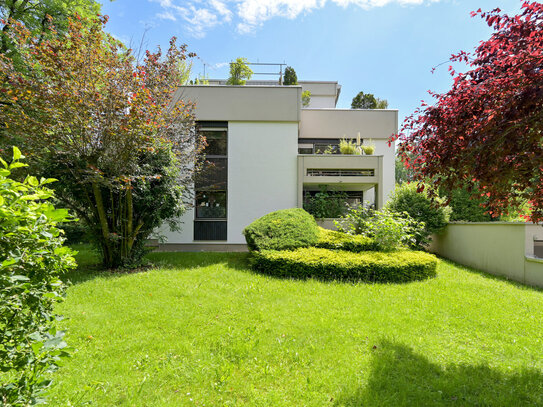 Gepflegte 3-Zimmer-Erdgeschosswohnung mit West-Balkon auf parkähnlichem Grundstück, solide vermietet