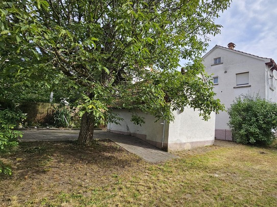 Handwerkerhaus mit Garten! Charmantes Ein- bis Zweifamilienhaus in netter Nachbarschaft