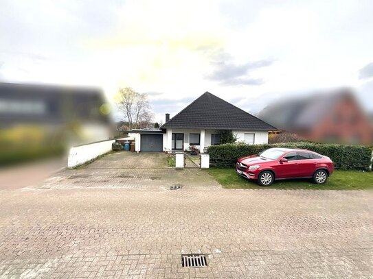 Charmanter Bungalow mit Garage und großer Außenterrasse in attraktiver Lage zu verkaufen