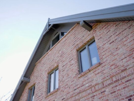 Hochwertige Neubauwohnung in strandnaher Lage mit Südbalkon