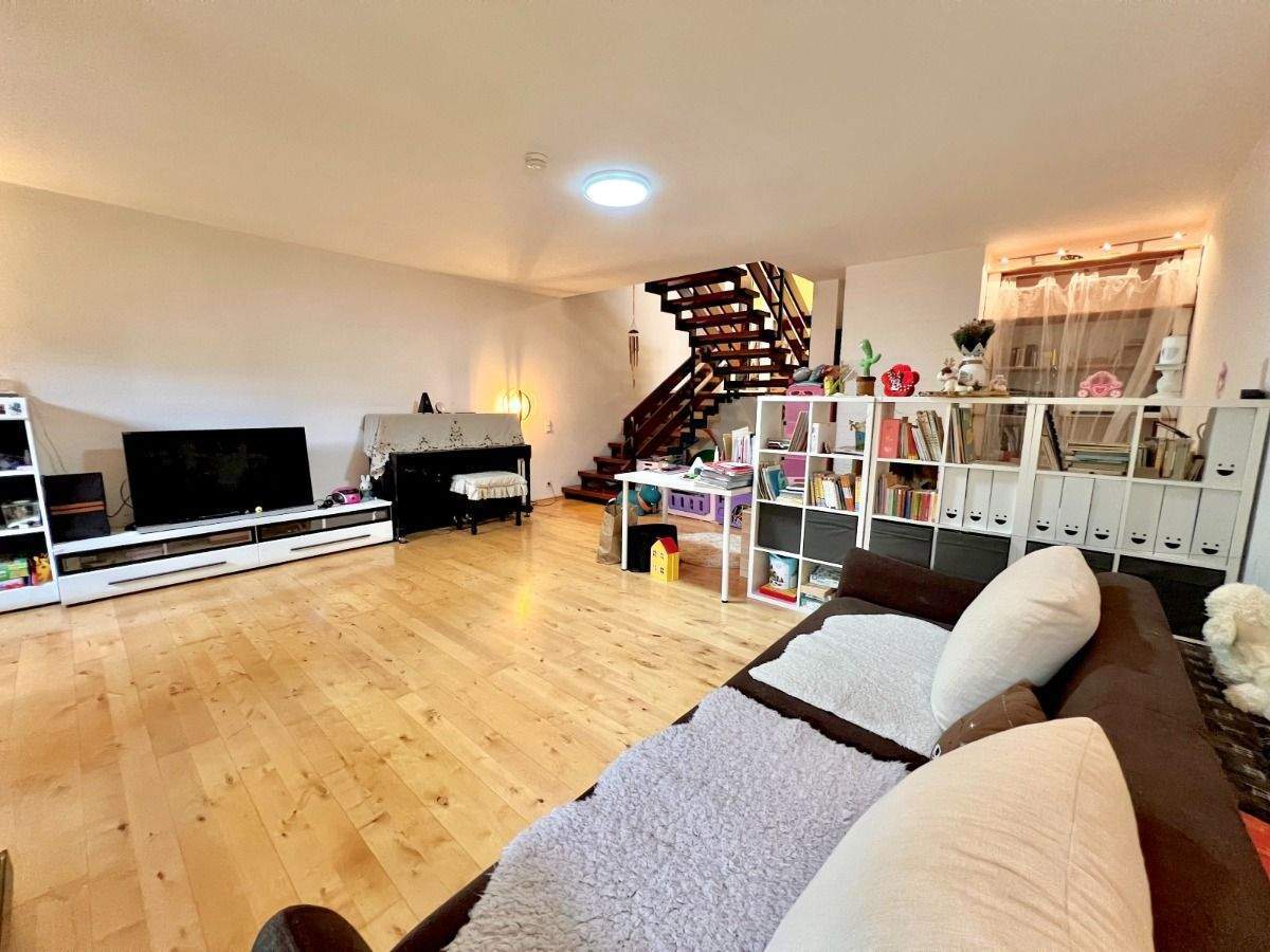 Individuelle Garten-Maisonette-Wohnung mit Split-Level-Architektur in gefragter Grünlage