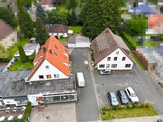 Attraktive Investitionsmöglichkeit: Zwei Mehrfamilienhäuser und ein Einfamilienhaus in Langen