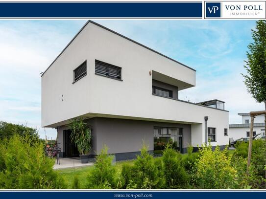 Einfamilienhaus im Bauhausstil mit Dachterrasse und PV-Anlage