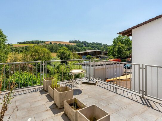 Attraktives Reihmittelhaus mit großer Dachterrasse und Garten - Ihr neues Zuhause wartet auf Sie!