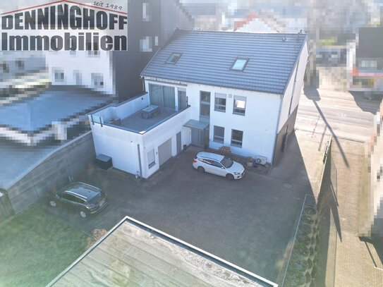 Modernes Einfamilienhaus mit 2 Garagen, Gewerberäumen und Halle in zentraler Lage von Dortmund-Wickede