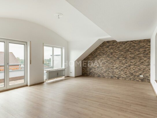 Sofort frei! Charmante 2-Zimmer-Maisonettewohnung mit Balkon, EBK und Stellplatz in zentraler Lage