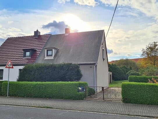 Einfamilienhaus als Doppelhaushälfte in gesuchter Siedlungslage