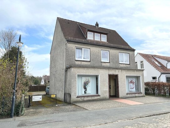 PURNHAGEN-IMMOBILIEN - Vermietetes Wohn- und Geschäftshaus in zentraler Lage von Bremen-Lesum