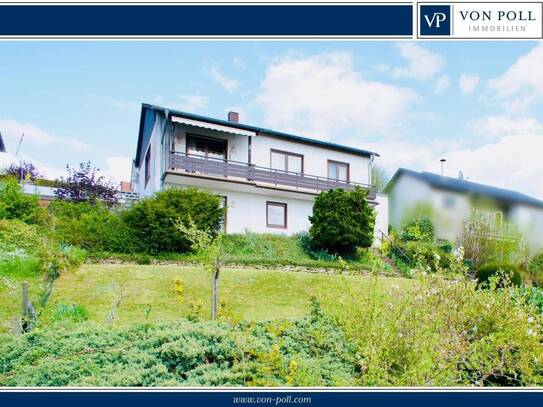 Gepflegtes Einfamilienhaus mit Einliegerwohnung, großem Garten und traumhaftem Blick über die Stadt