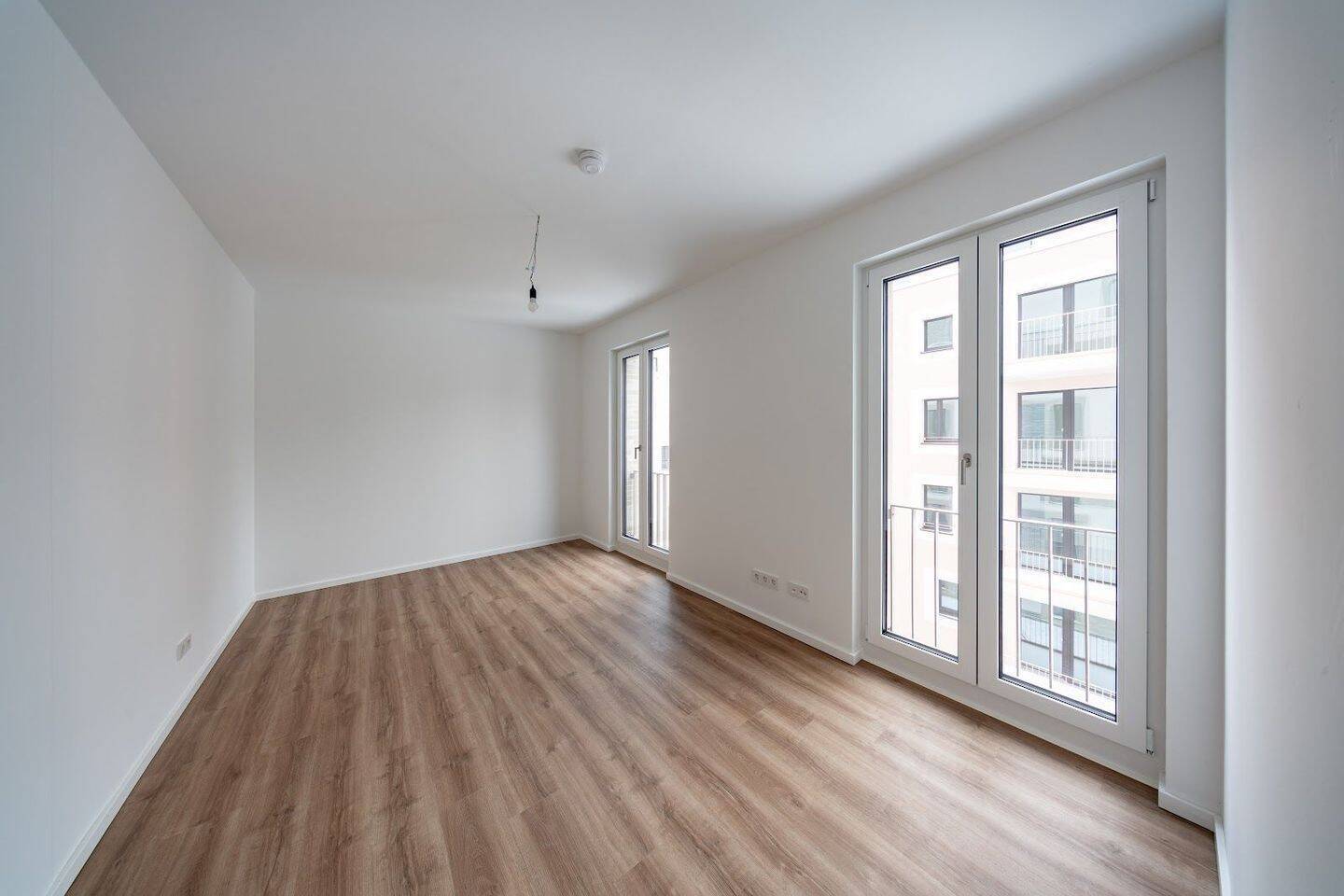 Neubauwohnung mit Fußbodenheizung und Balkon im Erstbezug - Foto 1