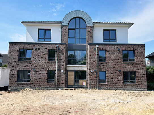 Wildeshausen. Neubau Nähe Ortskern! Großzügige 3- Zimmer-Eigentumswohnung mit schönem Sonnenbalkon.