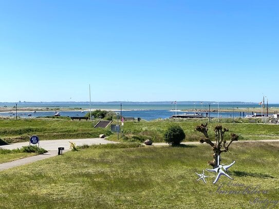 Sonnige, modernisierte Ferien-Eigentumswohnung mit Meerblick & eigenem Parkplatz am Wendtorfer Hafen