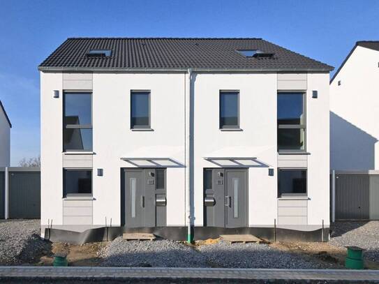 Neubaudoppelhaushälfte mit Terrasse, Garten und Garage im schönen Beerenbruchviertel