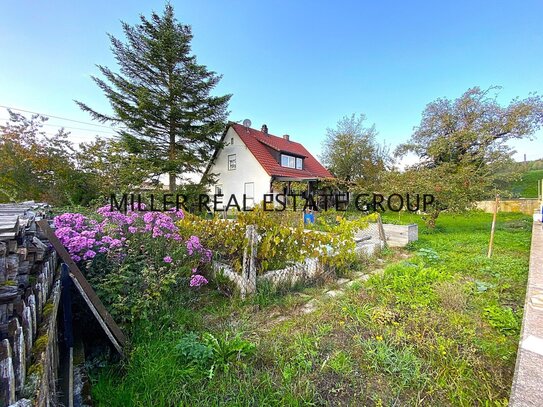 GROßZÜGIGES EINFAMILIENHAUS IN GRÜNER UND IDYLLISCHER LAGE