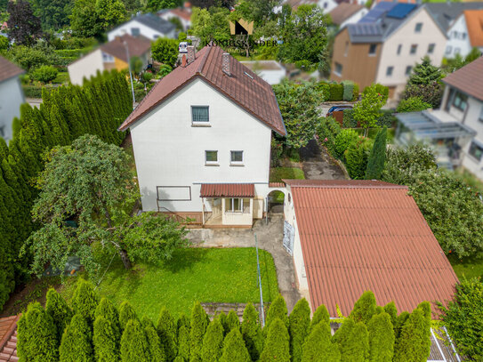 Seltene Gelegenheit - Charmantes Zweifamilienhaus mit großem Grundstück in ruhiger Lage.