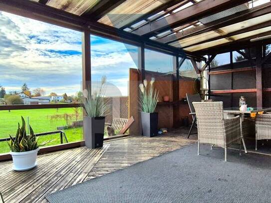 Großzügige Wohnung mit Terrasse und Gartenanteil