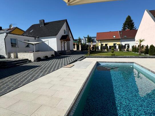 idyllisches Einfamilienhaus mit großem Garten, Garage und Pool