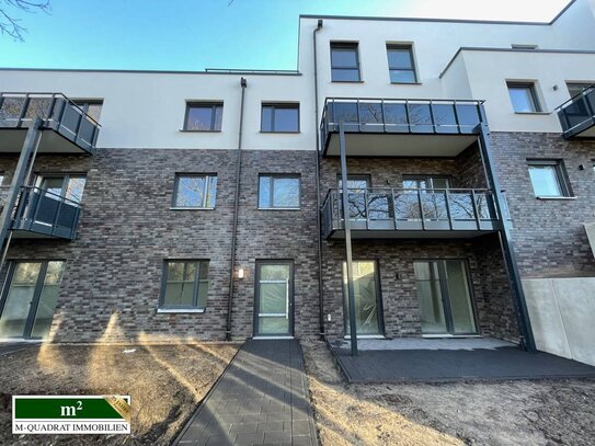 Neubauwohnung im Souterrain mit Terrasse