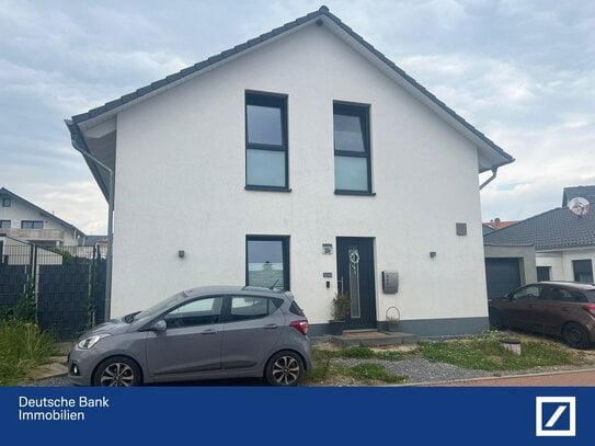 Ein familienfreundliches Einfamilienhaus mit schönem Garten wartet auf Sie!