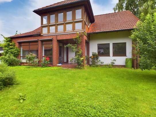 Charmantes Einfamilienhaus mit wunderschönem Garten in Toplage